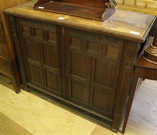 Panelled oak 2 door cabinet(-)